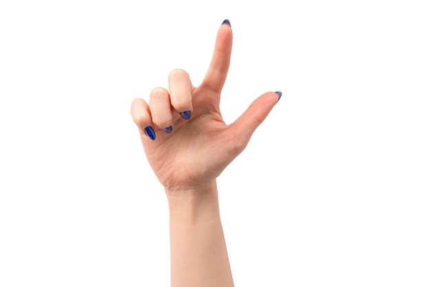 hand of a woman with blue nails isolated on a white background