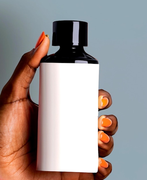 hand women holding a mockup bottle mock up design