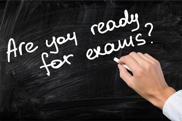 Photo hand writing on blackboard, are you ready for exams? concept