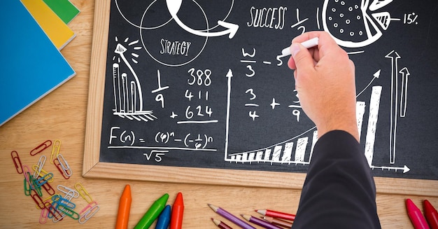 hand writing math strategy success text on blackboard