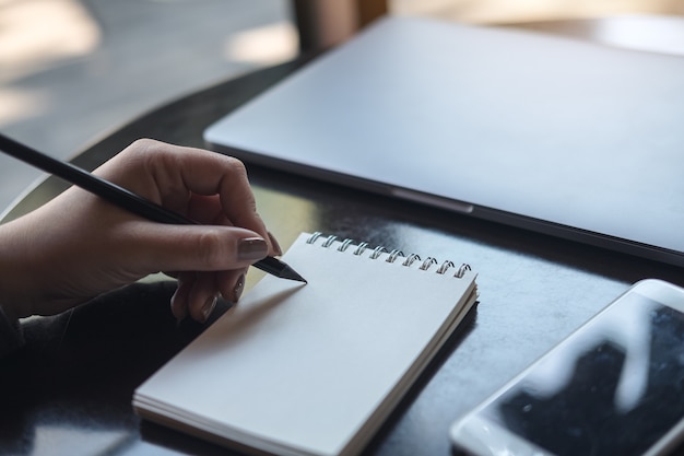 Hand writing on notebook 