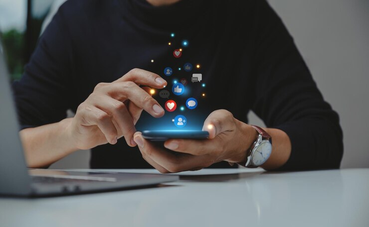 Photo hand of young business using smartphone