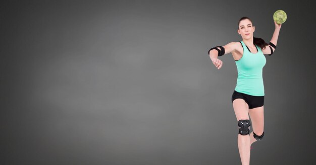 Handball woman with blank grey background