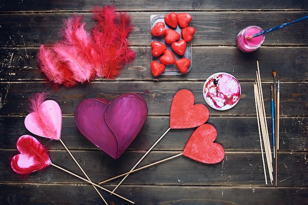 handcrafting on a wooden floor background view from above