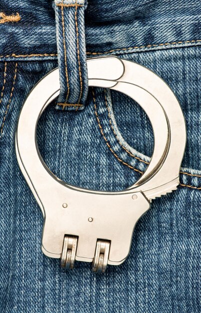 Photo handcuffs on jeans