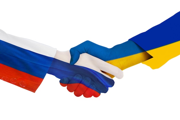 Handdruk elkaar met de vlag van Oekraïne en Rusland