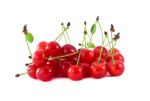 Handful of berries cherry closeup isolated on white surface