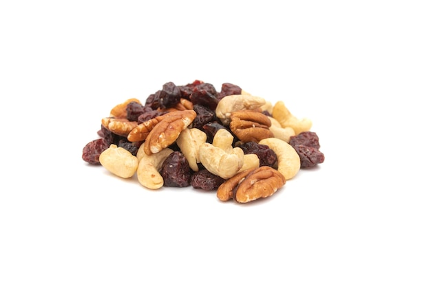 A handful of nuts and raisins isolated on a white background