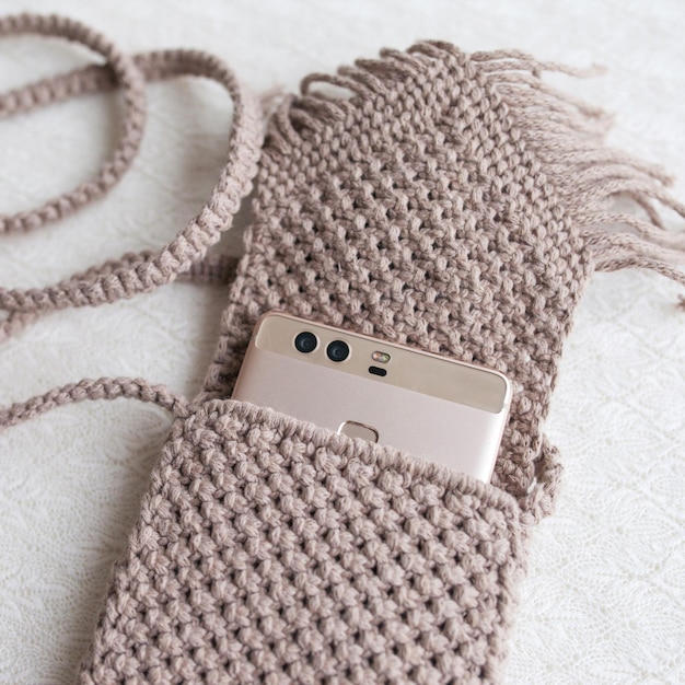 Handgemaakte macrame telefoon tas ECO vriendelijke natuurlijke macrame katoenen tas voor vrouw Hobby breien handgemaakte macrame Modern zomer concept voor vrouw