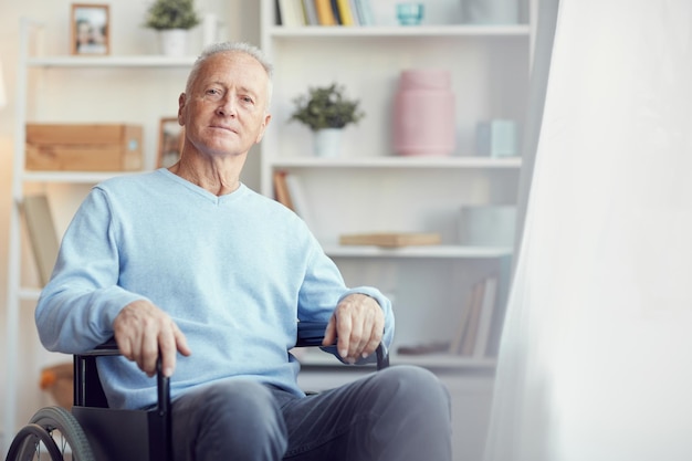 Handicapped senior man using wheelchair