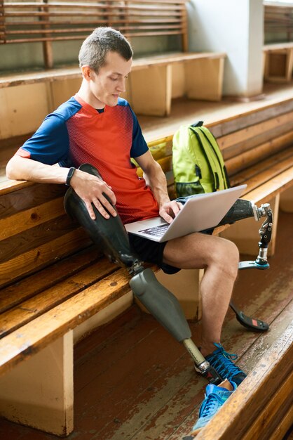 Handicapped Sportsman Using Laptop