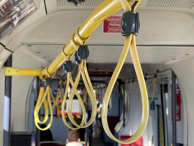 Handles on railing at modern public transport