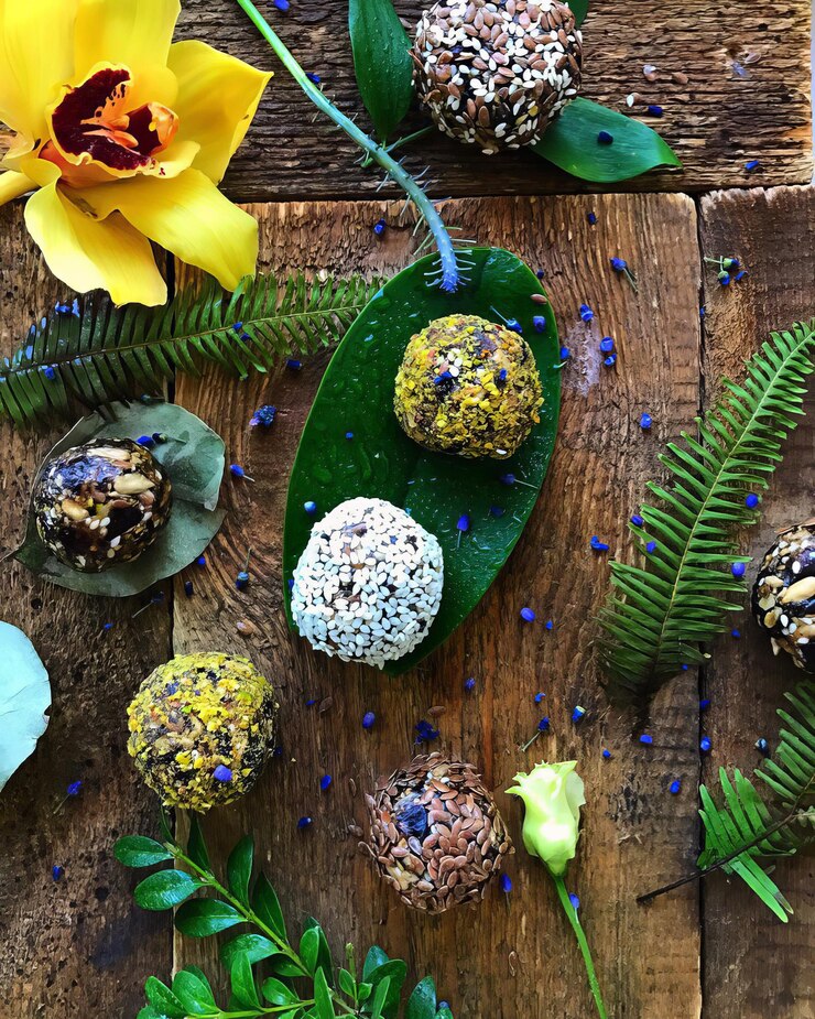 Photo handmade balls of flax grains on green plant leaves aigenerated item