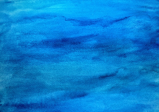 Ярко-синий акварель текстуры ручной работы абстрактный фон