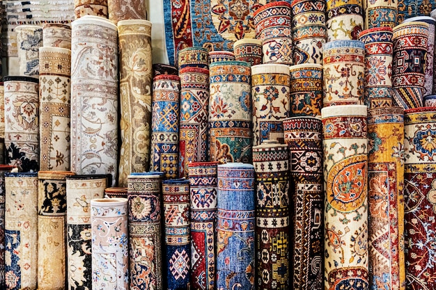 Handmade carpets. a lot of rolled carpets in the store are national Iranian oriental or Arabic or Turkish.