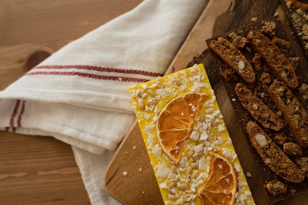 Handmade chocolate on a wooden tray