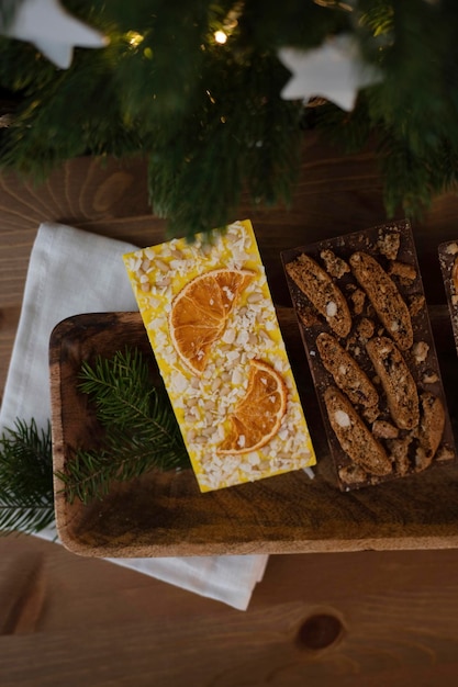 Handmade chocolate on a wooden tray