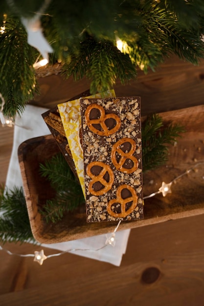 Handmade chocolate on a wooden tray