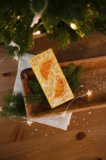 Handmade chocolate on a wooden tray