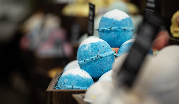 Handmade cosmetics, salt bright scented bath bombs. The concept of body care.