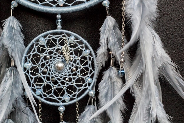 Handmade dream catcher with feathers threads and beads rope hanging