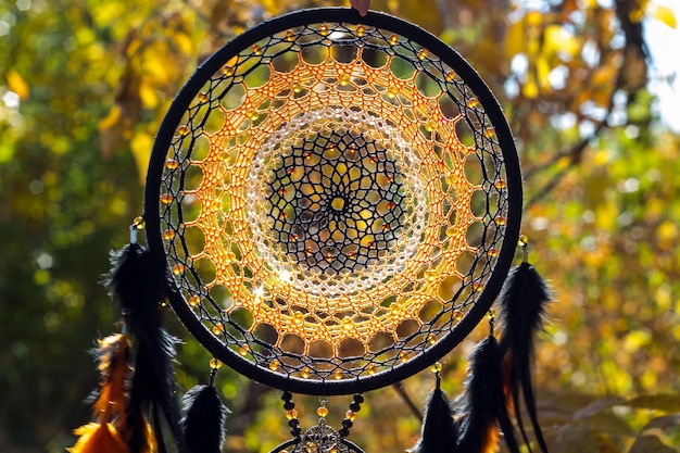 Handmade dream catcher with feathers threads and beads rope hanging