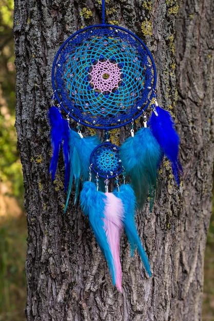 Handmade dream catcher with feathers threads and beads rope hanging