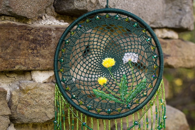 Handmade dreamcatcher with feathers