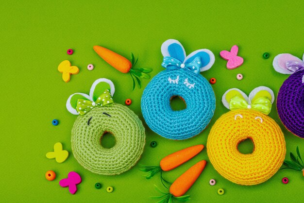 Handmade Easter concept Crocheted donuts bunnies with tradition