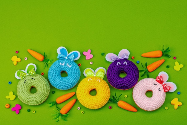 Handmade Easter concept Crocheted donuts bunnies with tradition