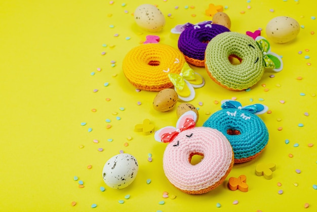 Handmade Easter concept Crocheted donuts bunnies with tradition