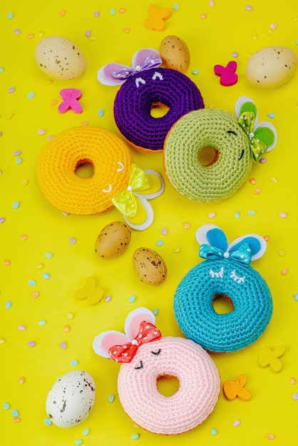 Handmade Easter concept Crocheted donuts bunnies with tradition