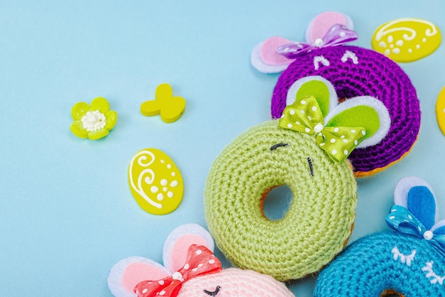 Handmade Easter concept Crocheted donuts bunnies with tradition