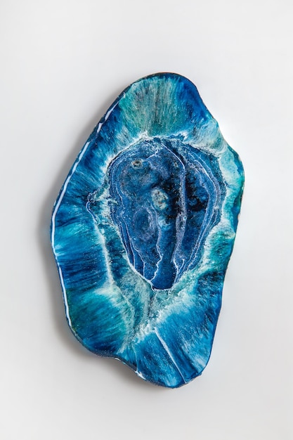 Handmade epoxy resin product a stand for jewelry in the form of a blue sea with waves