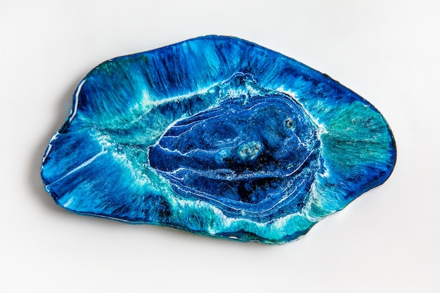 Handmade epoxy resin product a stand for jewelry in the form of a blue sea with waves