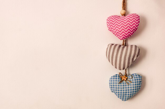 Handmade fabric hearts of different colors