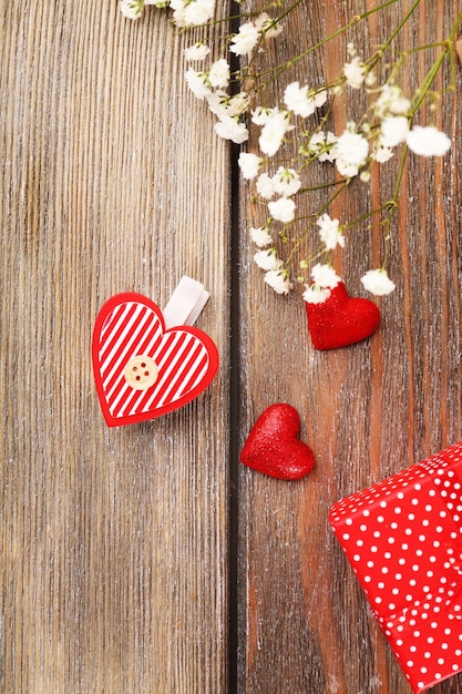 Handmade gift on Valentine Day, on wooden background