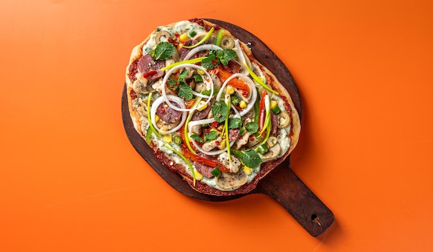 Handmade healthy pizza isolated on wooden board