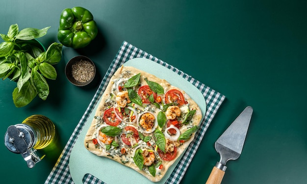 Handmade healthy square pizza isolated on same green theme