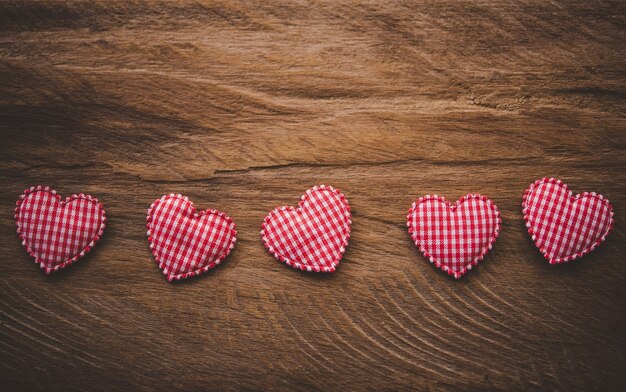 handmade heart on the wooden floor.