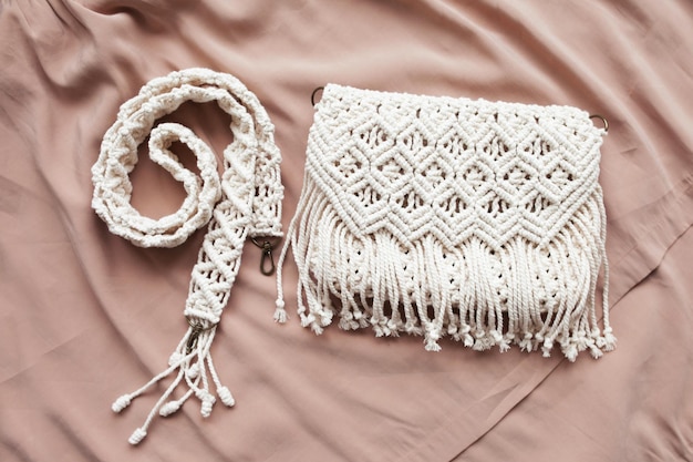 Handmade macrame cotton srossbody bag eco bag for women from\
cotton rope scandinavian style bag creme tones sustainable fashion\
accessories close up image