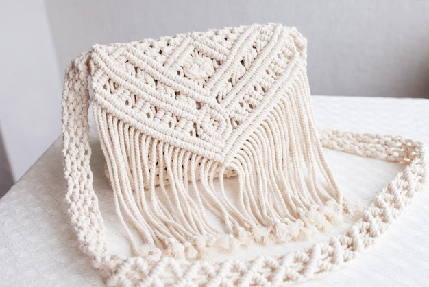 Handmade macrame cotton srossbody bag Eco bag for women from cotton rope Scandinavian style bag Creme tones sustainable fashion accessories Details Close up image