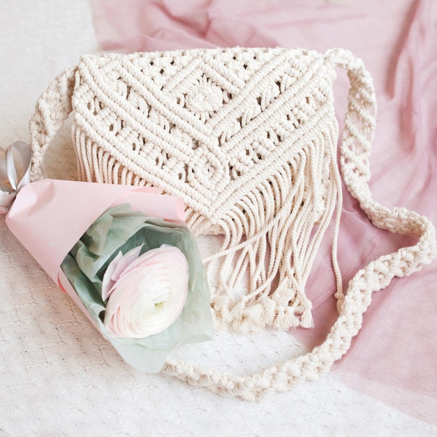 Handmade macrame cotton srossbody bag eco bag for women from\
cotton rope with gentle flower scandinavian style bag pink tones\
sustainable fashion accessories