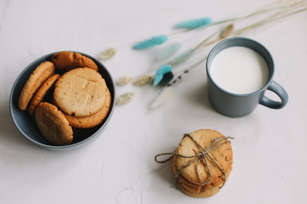 Handmade oatmeal cookies with milk top view