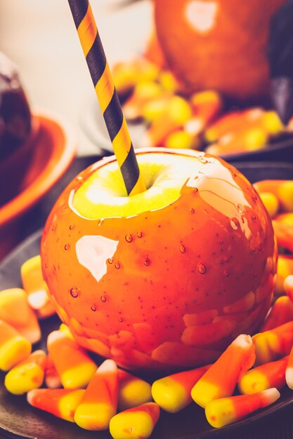 Handmade orange candy apples for Halloween.