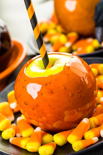 Handmade orange candy apples for Halloween.