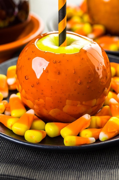 Handmade orange candy apples for Halloween.