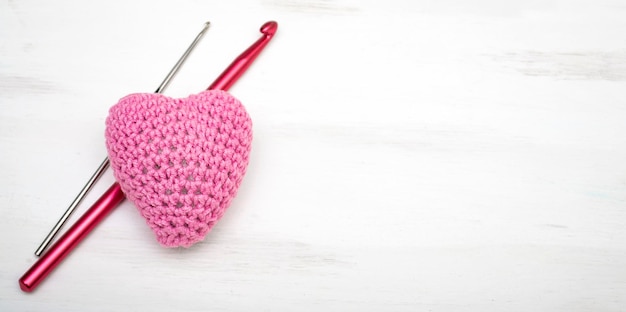 Handmade pink knitted heart