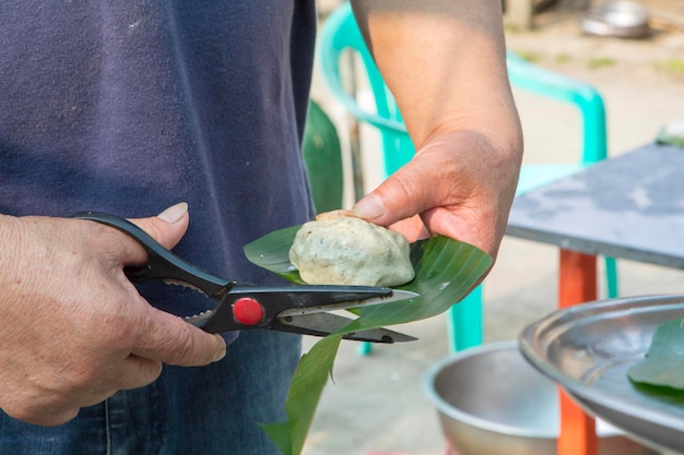 Handmade pruning scissors grass cake plantain leaves