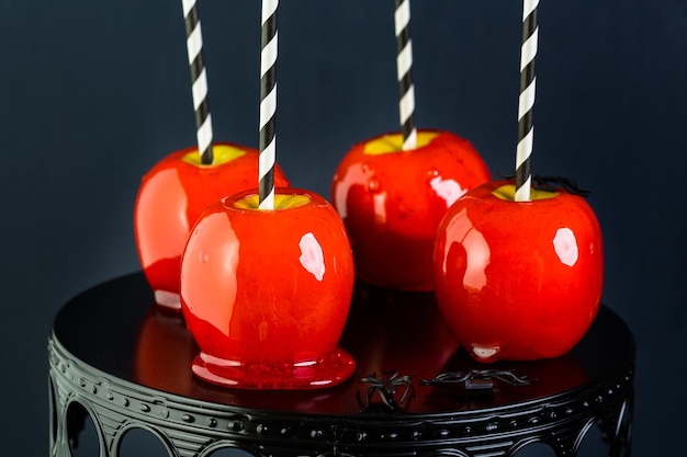 Handmade red candy apples for Halloween.